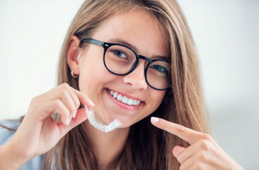 Если необходимо закрепить правильное положение зубов после исправления прикуса